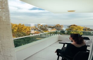 Deluxe Suite Sea View with Balcony | 1 bedroom, desk, laptop workspace, iron/ironing board