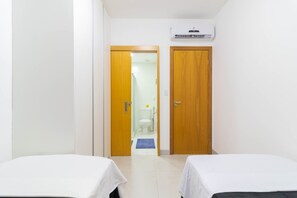 2 bedrooms, blackout curtains, iron/ironing board, free WiFi