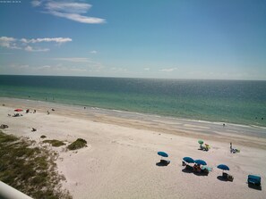 On the beach, sun-loungers, beach towels