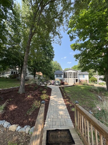 Cozy on the lake view of Lake Gaston. Pontoon boat may be available .