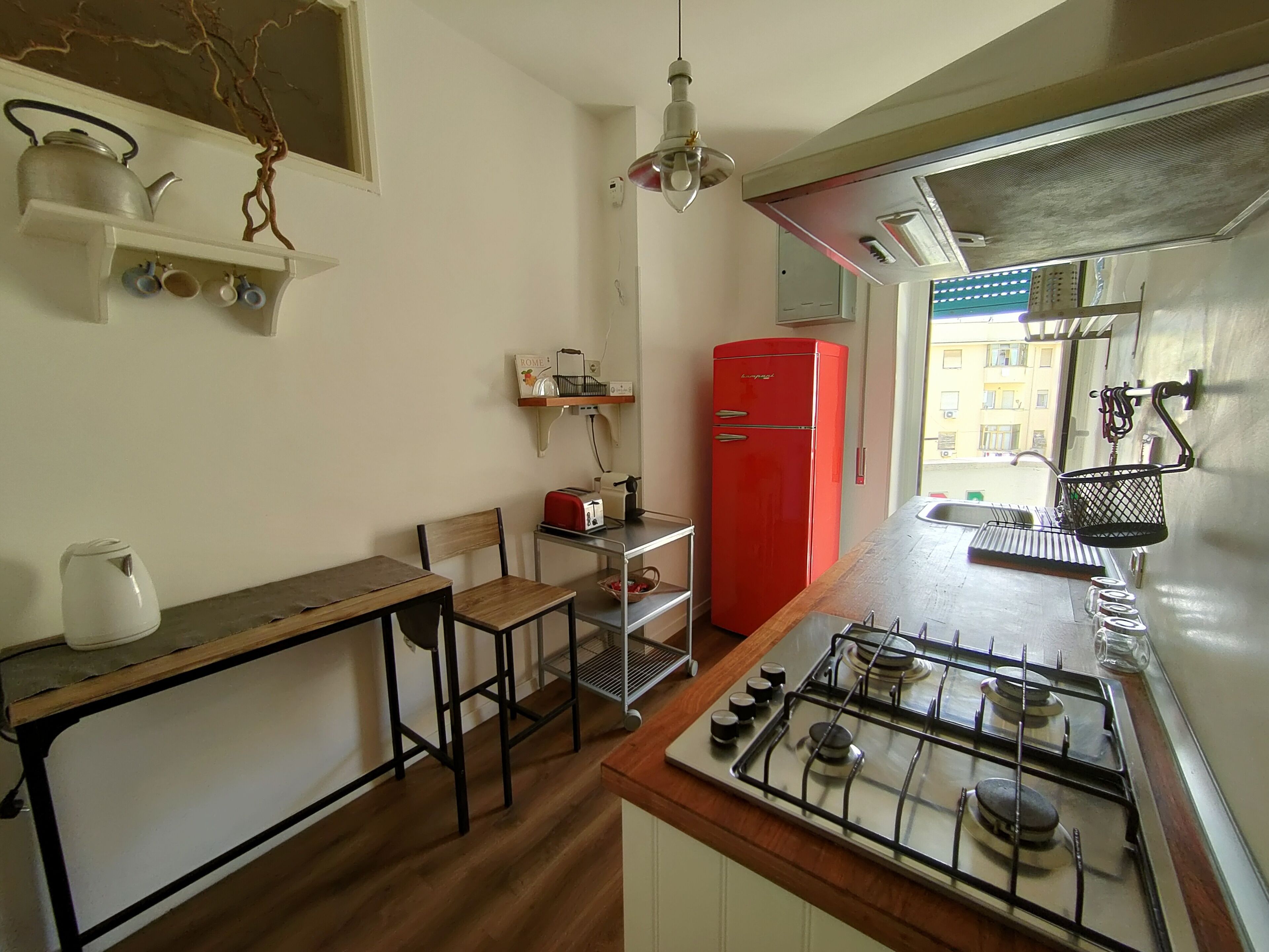 Fridge, microwave, stovetop, coffee/tea maker