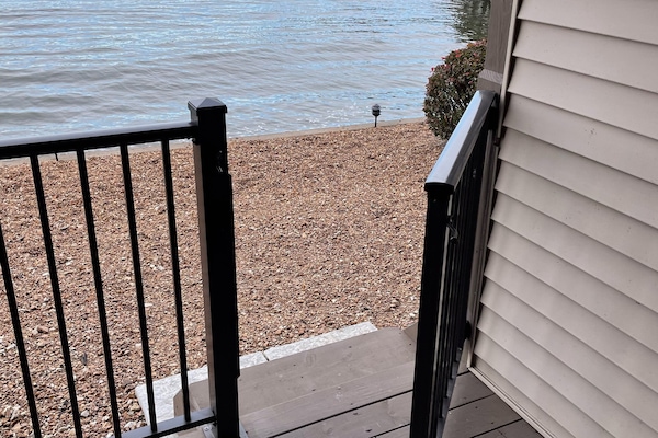 direct lake access from back deck. Less than 12 steps from the water.