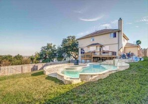 A two-story house with a swimming pool in the backyard. - G-L-A-M Home in Alamo Ranch San Antonio (San Antonio)