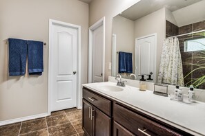 Combined shower/bathtub, hair dryer, towels, soap