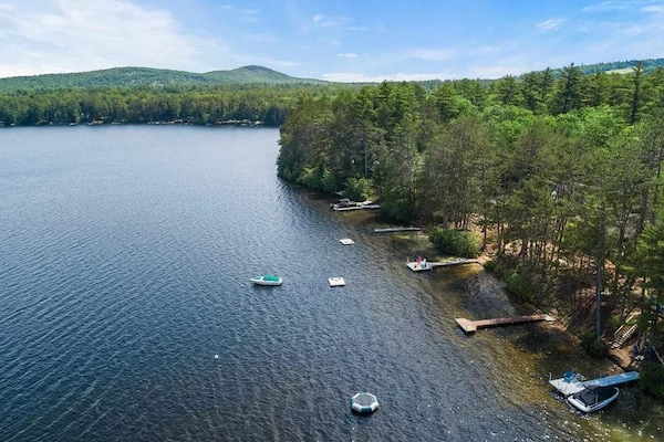 Peaceful, clean lake with mountain views.
