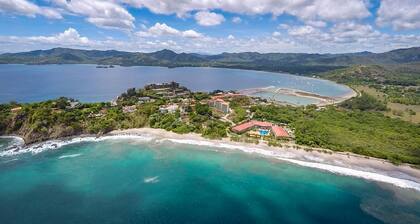 Elegant Oceanview Condo with Spacious Open-Concept Floor Plan and Inviting Beach Design