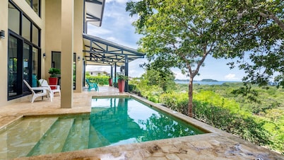 Nostalgic Retro Home on Luxurious Lot with a Private Infinity Pool and Ocean Views