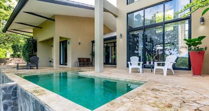 Nostalgic Retro Home on Luxurious Lot with a Private Infinity Pool and Ocean Views