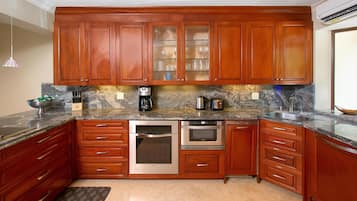 Villa, 2 Bedrooms, Ocean View | Private kitchen | Full-sized fridge, microwave, stovetop, dishwasher