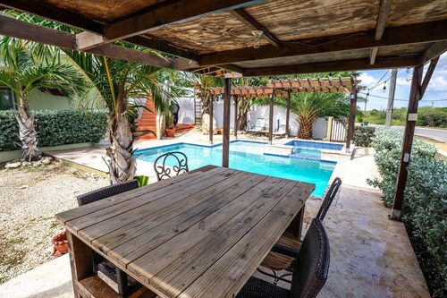 A Central 2nd floor 1 bedroom apartment with  a nice balcony view & a nice pool.