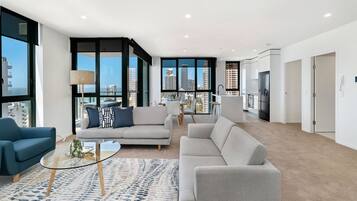 Two Bedroom Ocean View | Living room | Flat-screen TV