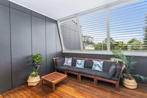 TV, fireplace, books