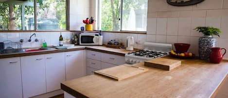 Fridge, microwave, toaster, cookware/dishes/utensils