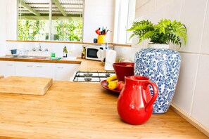 Fridge, microwave, toaster, cookware/dishes/utensils