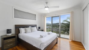2 habitaciones, tabla de planchar con plancha y ropa de cama
