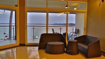 32-inch flat-screen TV with satellite channels, TV, books