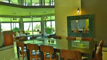 Villa (Blusalz Manor Waters Edge) | Living area | 32-inch flat-screen TV with satellite channels, TV, books