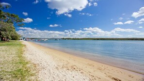 Enjoy a serene beach experience with access to calm waters and scenic views.