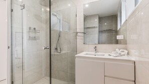 Shower, towels, toilet paper