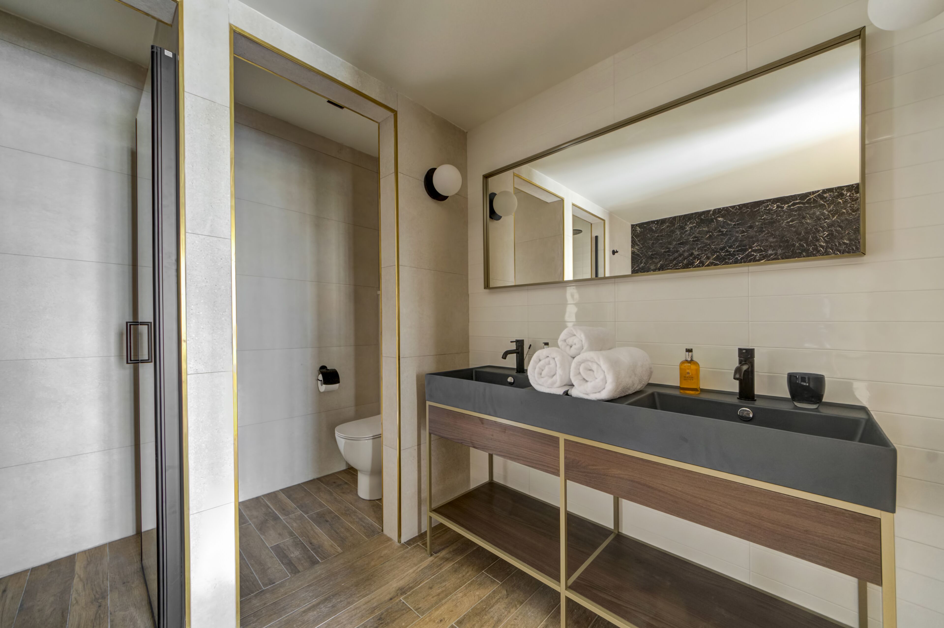 luxury suite, sea view | bathroom | designer toiletries, hair dryer, bathrobes, slippers