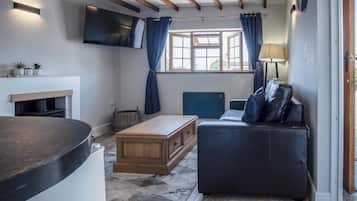 32-inch flat-screen TV with cable channels, TV