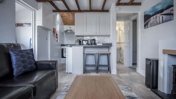 32-inch flat-screen TV with cable channels, TV