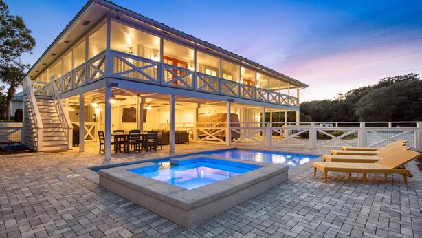 A two-story house with a covered outdoor area, a swimming pool, and lounge chairs. - Private Pool | LSV | 2 Min Walk to Beach (Santa Rosa Beach)