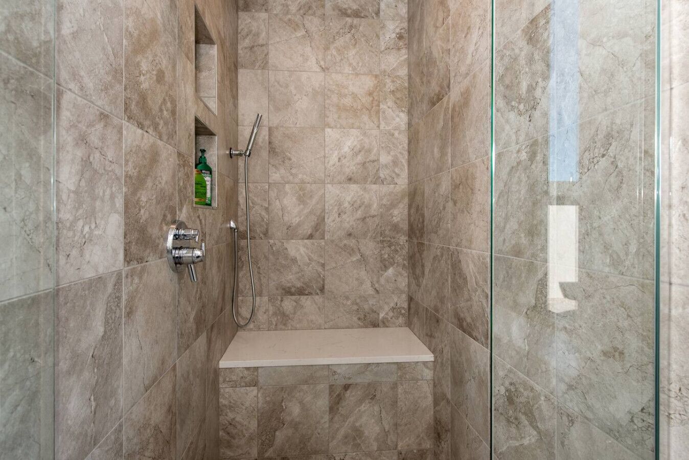 Combined shower/bathtub, hair dryer, towels, soap