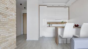 Appartement Deluxe | Cuisine privée | Grand réfrigérateur, four, plaque de cuisson, lave-vaisselle