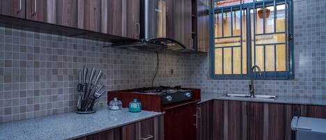 Fridge, microwave, coffee/tea maker, toaster