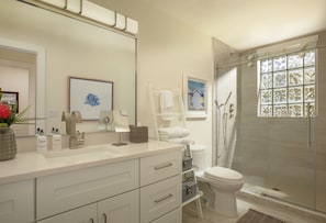Shower, hair dryer, towels, soap