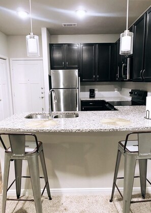 Fridge, microwave, dishwasher, toaster - Lexys luxury one bedroom Unit (Frisco)