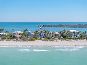 On the beach, sun-loungers, beach towels