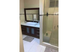 Shower, bidet, towels, soap