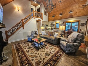 Smart TV, fireplace, books, stereo