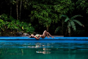 2 outdoor pools, open 8:00 AM to 8:00 PM, pool umbrellas, pool loungers