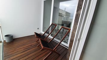 Bed in a Shared Mixed Room , Shared Bathroom ( 4 pax) | Balcony