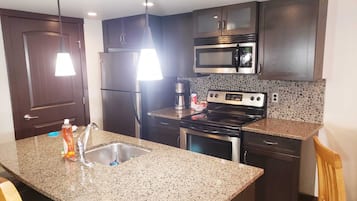 Microwave, stovetop, dishwasher, coffee/tea maker