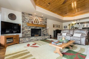 House, Multiple Beds, Hot Tub (Bluebonnet Surprise) | Living room | 50-inch flat-screen TV with digital channels
