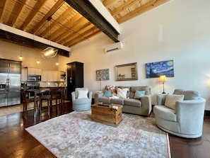 Living room with 20 ft ceilings