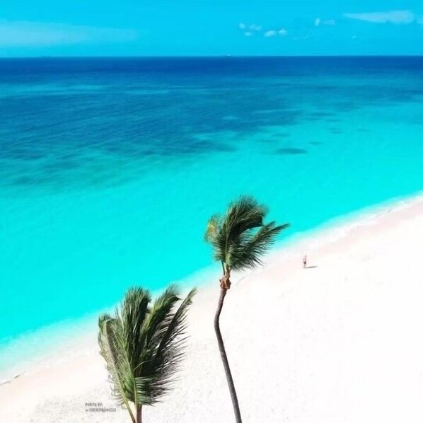 On the beach, sun-loungers, beach towels