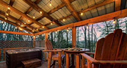 Private Wooded Cabin w/ Hot Tub, Fire Pit & Arcade