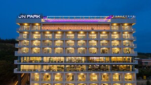 A multi-story hotel with a prominent "JN PARK" sign, featuring a modern architectural design with balconies and large windows. - JN Park Hotel (Incheon)