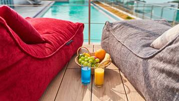 Outdoor pool, open 3:00 PM to 9:00 PM, sun loungers