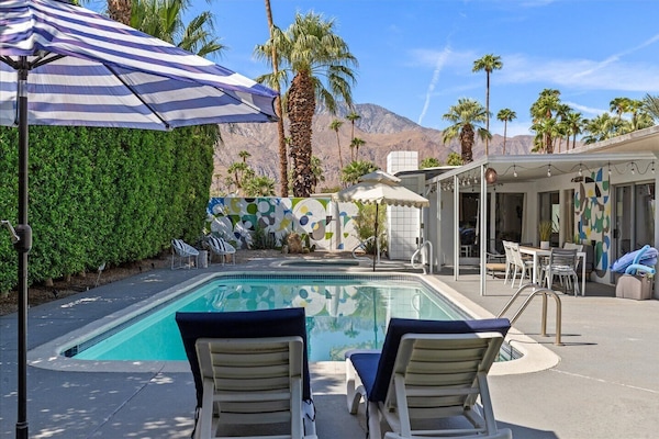 Pool, hot tub, deck with mountain views.