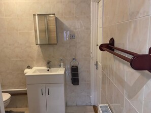 Shower, free toiletries, hair dryer, towels