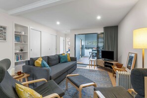 TV, books - Coastal Retreat - Modern beach house at Murramarang South Coast Walk. (Kioloa)