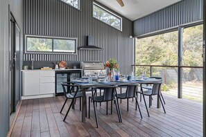 Outdoor dining - Coastal Retreat - Modern beach house at Murramarang South Coast Walk. (Kioloa)