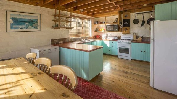 Fridge, microwave, toaster, cookware/dishes/utensils
