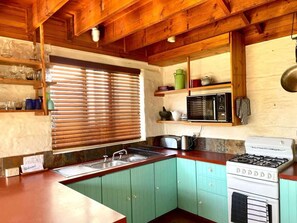 Fridge, microwave, toaster, cookware/dishes/utensils
